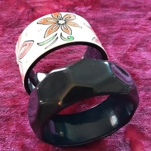 2 bracelets Floral and black. Great for summer.